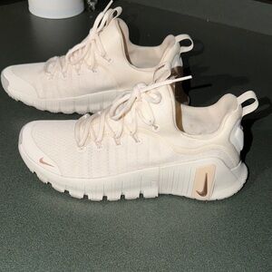 Nike Women's Pale Pink/Beige Flex-Style Training Sneakers